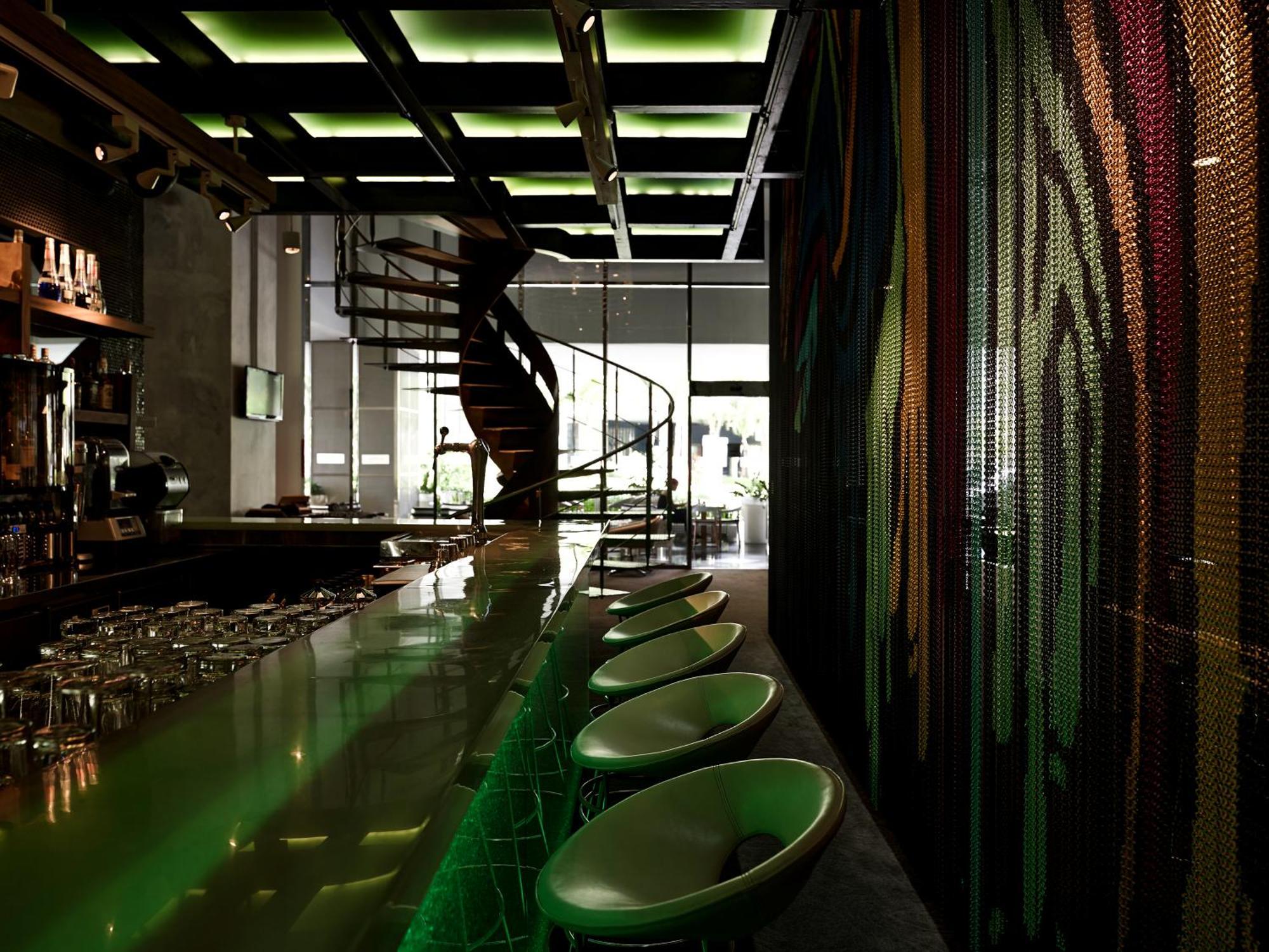 Pullman Jakarta Central Park Екстер'єр фото Interior of the bar