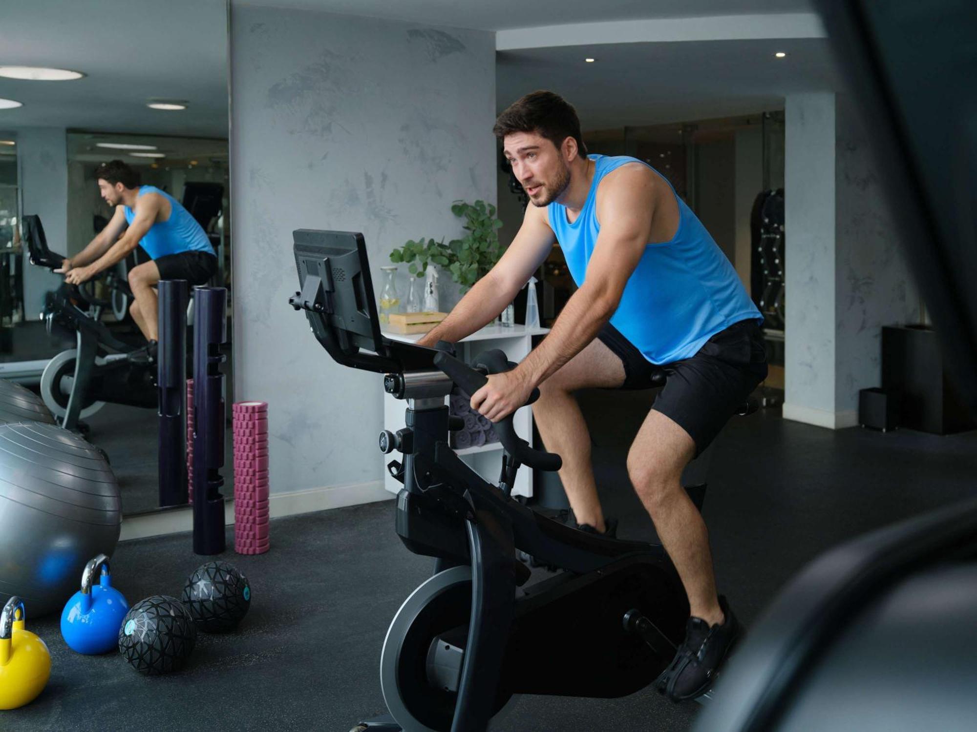 Pullman Jakarta Central Park Екстер'єр фото A man on a stationary bicycle